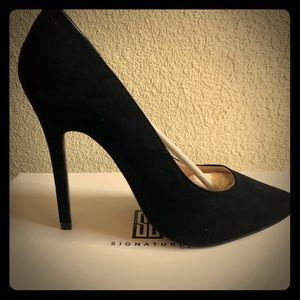 Classic black pumps